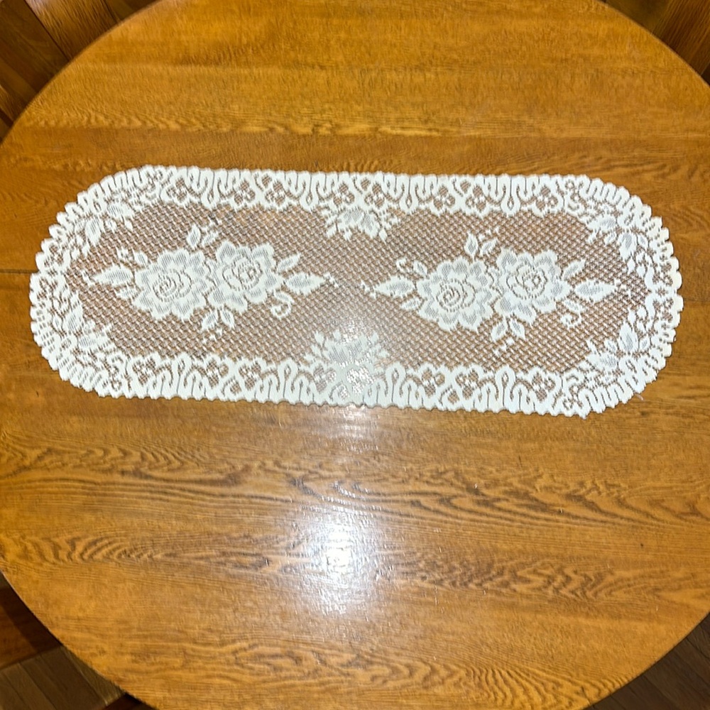 #2 Oval doily 36”x 14” Rose pattern
